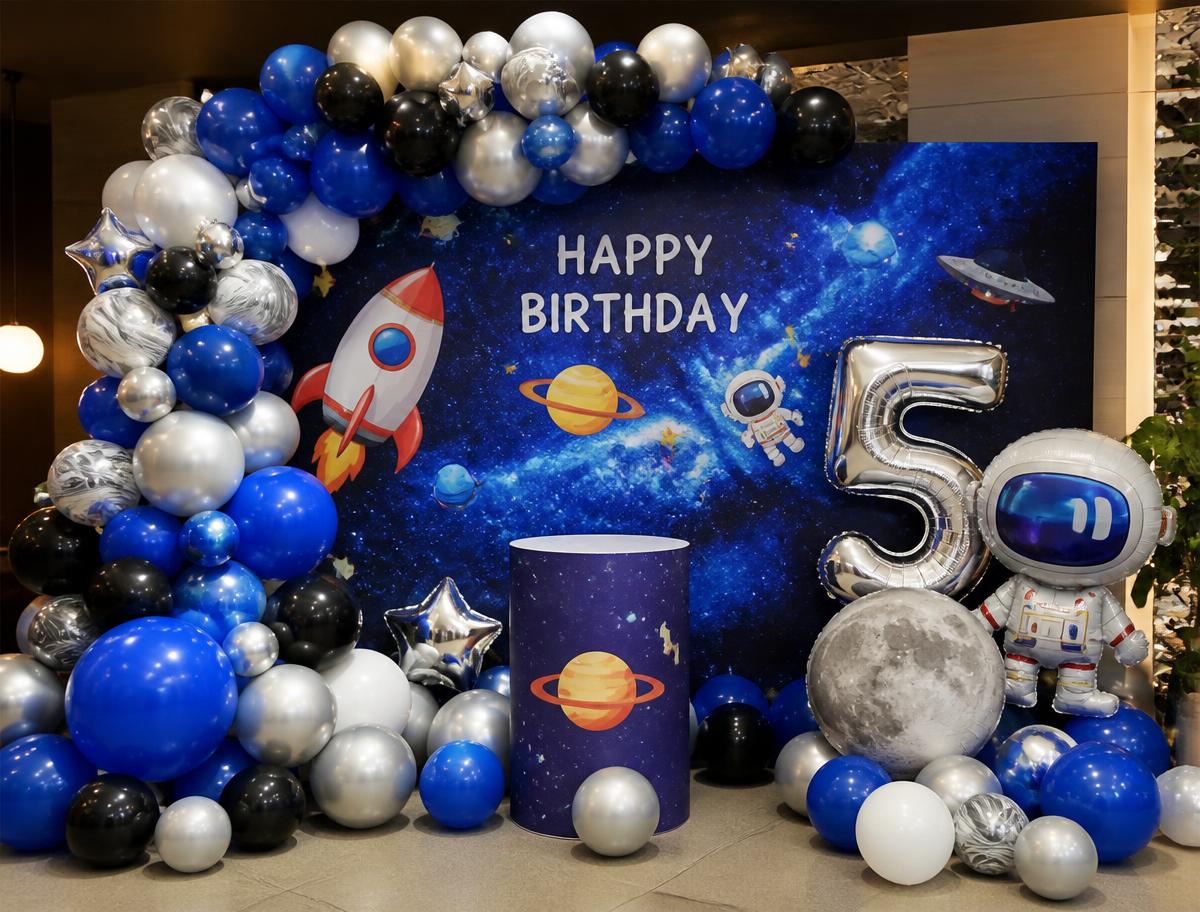 Space explorer themed kids' birthday backdrop with astronaut balloons in Abu Dhabi